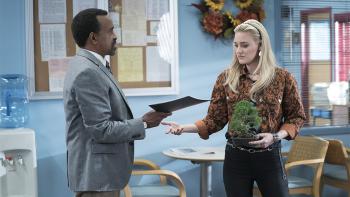 Schooled TV Series: Principal Glascott (Tim Meadows) hands Lainey (AJ Michalka) her syllabus