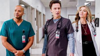 Scrubs TV show screenshot 1: Turk, J.D. and Elliott stand together in a hallway at Sacred Heart Hospital