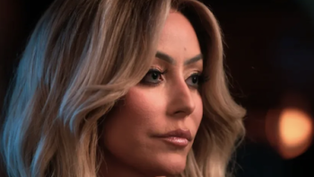 Sean Combs: The Reckoning TV show screenshot 2: Close up profile of Aubrey O'Day with long brown wavyhair. 