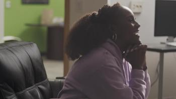 Seen & Heard: The History of Black Television: Issa Rae sits in a chair, speaking to the camera. 