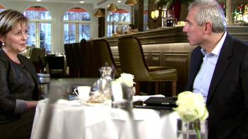 Selling London: A man and woman negotiate a property deal