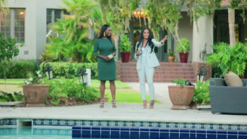 Selling Tampa TV Show: Looking at a giant swimming pool. 