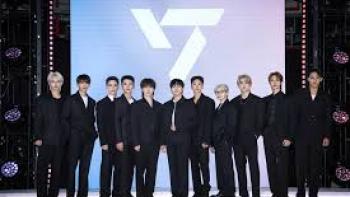 Seventeen: Our Chapter TV show screenshot #1: The band lines up on a stage