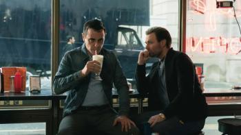 Sexy Beast TV show screenshot 2: Don and Gal sit together on stools at a diner; Gal is drinking a milkshake.