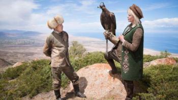 Joanna Lumley's Silk Road Adventure: Joanna Lumley with a bird of prey perched on her wrist standing next to a man