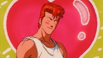 Slam Dunk TV show screenshot 2: Hanamichi smiles cheerfully. Behind him is a large pink heart against a yellow background.