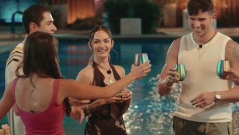Sneaky Links: Dating After Dark TV show screenshot 2: Four cast members make a toast next to pool.