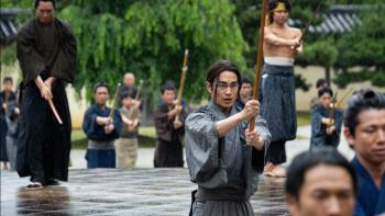 Song of the Samurai TV Show screenshot 1: Yamanami Keisuke and other dojo members practice their fighting stance with wooden swords
