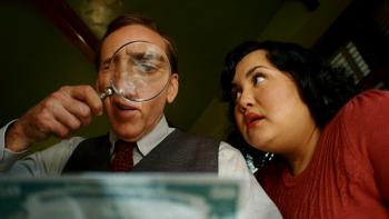 Spider-Noir TV show screenshot 3: Ben and assistant Janet investigate a hundred dollar bill