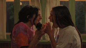 Sterling Point TV show screenshot 3: Annie and Ramona face each other, mouths open in shock or surprise; both have wet hair and are in damp T-shirts
