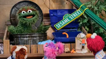 Storm On Sesame Street TV: After the storm, Abby and Elmo talk to Oscar the Grouch in a trash can where the Sesame Street sign has fallen.