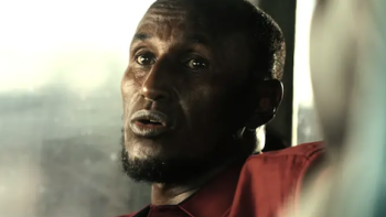 Surviving Black Hawk Down TV show screenshot 2:Yasmeen Dheere in red shirt. 