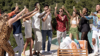 Surviving Paradise TV show screenshot 1: Contestants toast with champagne on pool deck.