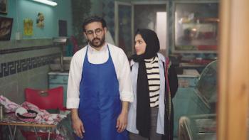Tahir's House TV show screenshot 2: a mopey Tahir is consoled by his sister in the fish shop