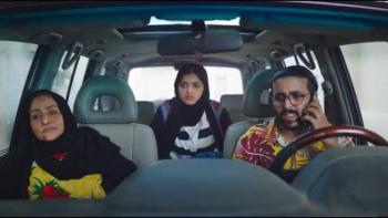 Tahir's House TV show screenshot 3: Tahir, his sister, and his grandmother in the car