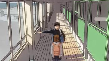 Tatsuki Fujimoto 17-26 TV show screenshot 3: Ibuki points to his right while talking to Yuri in their school’s hallway