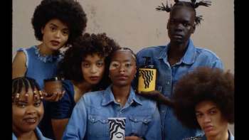 The Black Beauty Effect: An ad for Black women's products shows Black models with different shades of skin and different hair styles and textures.