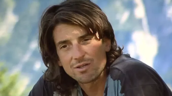 The Dark Wizard TV show screenshot 1: Dean Potter with long hair and brown shirt.