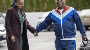 The Fall and Rise of Reggie Jenkins screenshot 3: Monica holds Reggie's hand as they walk in a parking lot. 