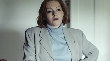 The Gold TV show screenshot 1: Nicki Jennings (Charlotte Spencer) stands with hand on hip.