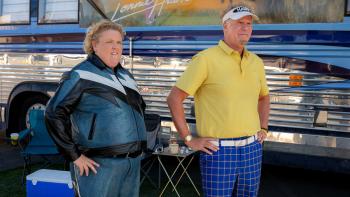 The Hawk TV show screenshot: Fortune Feimster and Will Ferrell wear their golf gear