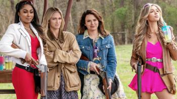 The Hunting Wives TV show screenshot 2: Monae, Sophie, Jill and Taylor are lined up to shoot targets, clutching rifles