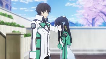 The Irregular at Magic High School: Tatsuya pats Miyuki's head. They stand in front of their school gate on a sunny spring day.