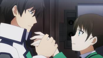 The Irregular at Magic High School: Close-up of Tatsuya, calm, grabbing Sayaka's hand as as she raises it in anger.