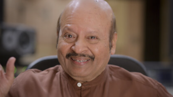 The Roshans TV show screenshot 3: Rajesh Rojan smiles wearing brown kurta.