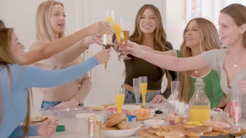The Secret Lives of Mormon Wives screenshot 1: The moms toasting with mimosas and soda at brunch. 