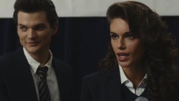 Homer Gere and Kaia Geber wear dark blue and white school uniforms.