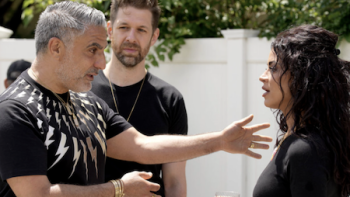 The Valley: Persian Style TV show screenshot 2: Reza Farahan and Adam Neely dressed in black talking to Golnea ‘GG’ Gharachedaghi.