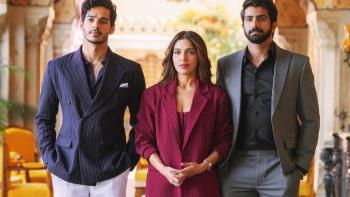 The Royals TV show screenshot: A young Indian woman stands between two young Indian men, all wearing business wear.