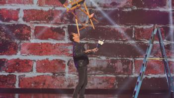 The Big Stage TV Series: A comedian balances things on his nose. 