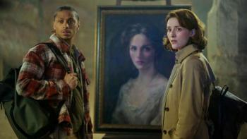 The Librarians The Next Chapter TV: Connor and Lyra look surprised, standing on opposite sides of an old panting of a woman look-alike. 