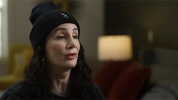 Thirst Trap TV show screenshot 2: A fan of William White's named Carrie wears a knit black beanie and reddish lipstick