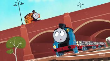 Thomas & Friends Sodor Sings Together TV: Thomas looks up after passing underneath a bridge to see Nia, who's smiling from the top of the bridge.
