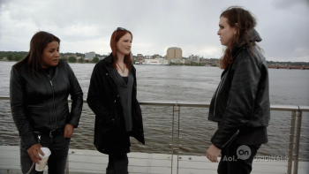 True Trans with Laura Jane Grace TV show: Grace speaks with two other people next to a body of water on an overcast day