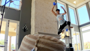 UHC: Ultimate Home Championship TV Show: Kristopher London clears some height in his living room. 