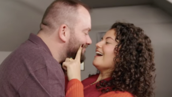 Virgins TV show screenshot 1: Alexander Stunz gets stopped by woman when leaning in to her. 