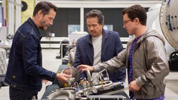 From R to L: Keanu Reeves and Gard Hollinger. Reeves wears a denim jacket, and Hollinger wears a blue one.