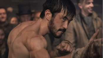 Warrior screenshot 1: Shirtless Ah Sahm in fighting position.