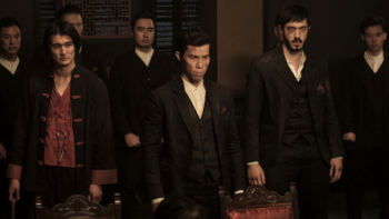 Warrior screenshot 3: Young Jun stands with members of the Hop Wei tong.  