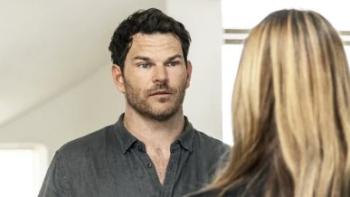 Watching You TV show screenshot 2: Josh Helman wears a dark grey buttoned shirt.