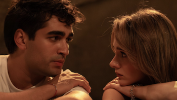 We'll Be Fine TV show screenshot 2: Man and woman positioned close to eachother gazing at each other intensely in warm light.