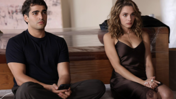 We'll Be Fine TV show screenshot 3: Man and woman sitting on the floor, both looking serious.
