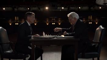 A West Wing Special TV Show: Deputy Communications Director Sam Seaborn sits across a table from President Bartlett as they play chess and discuss a crisis in the Taiwan Strait