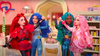 Wickedly Sweet: A Descendants Short Story TV screenshot 1: Doll versions of Red, Chloe, Uliana and Bridget hold up cupcakes, celebrating together.