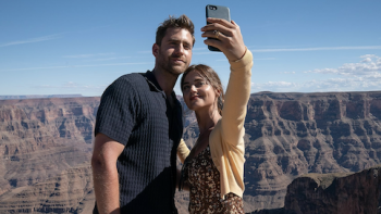 Wildnerness screenshot 3: Will and Liv take selfie on ledge overlooking Grand Canyon.