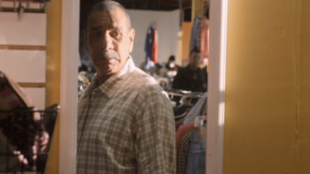 Trying on an outfit after getting out of prison. 